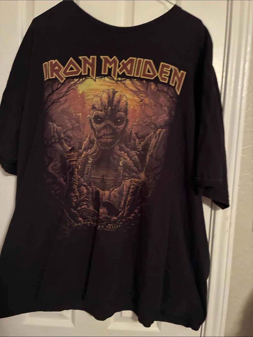 Delta Black Iron Maiden Graphic Tee with Yellow and Brown Print